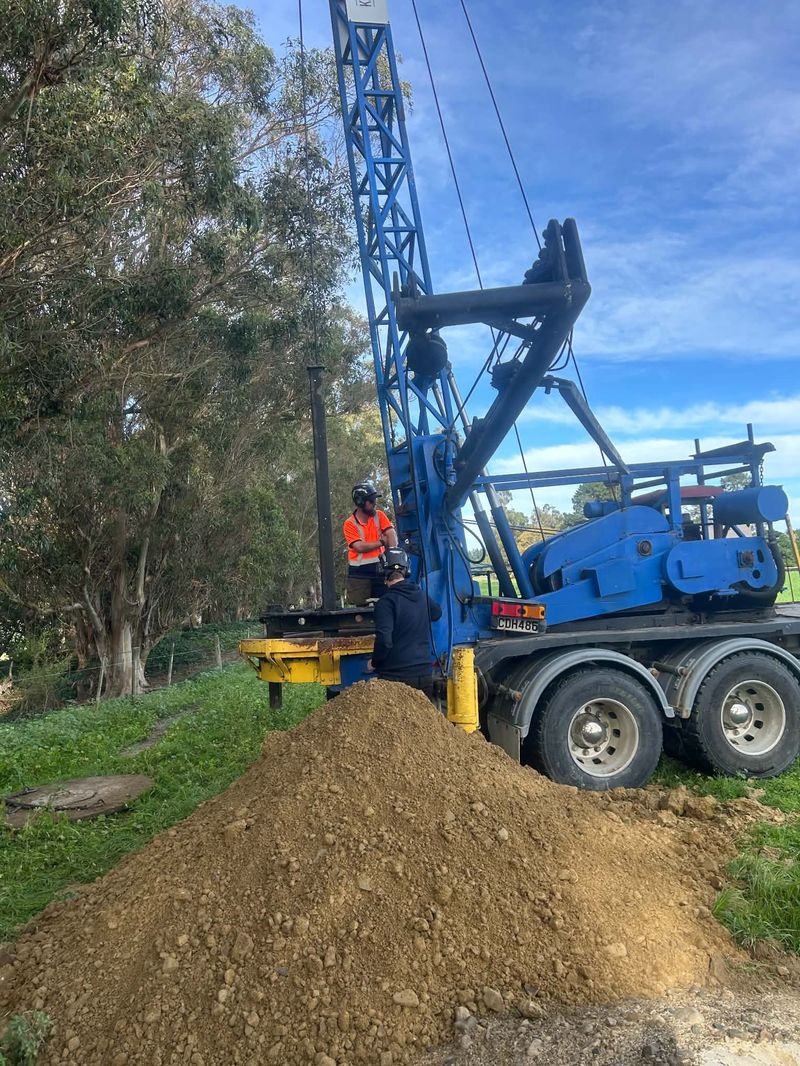 Rig with spoil pile
